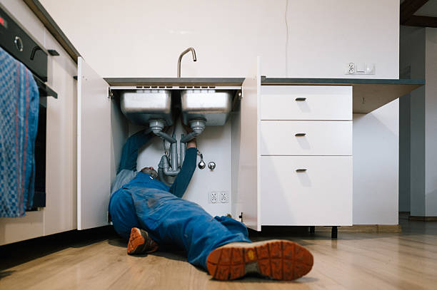 Professional Drain Cleaning technician working in Glenarm, IL